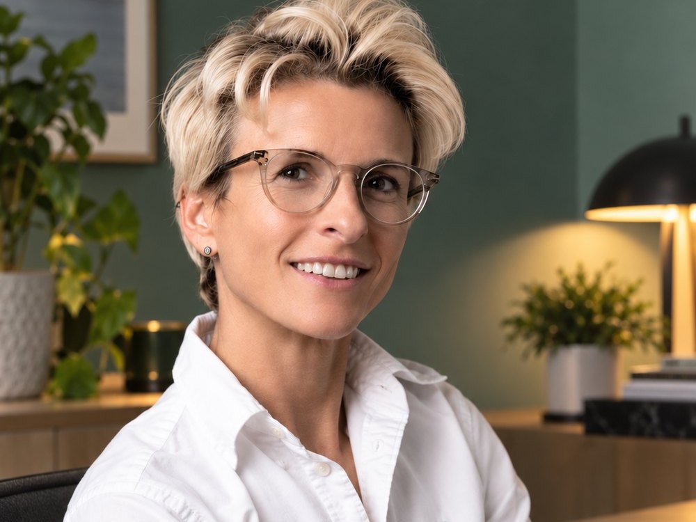 Lou Nicholettos, founder of Performance Health, at her desk